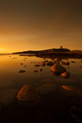 Dunstanburgh Castle tide coming in