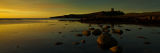 Dunstanburgh Castle tide coming in
